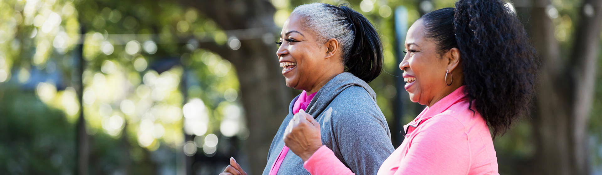 Two women exercising outside