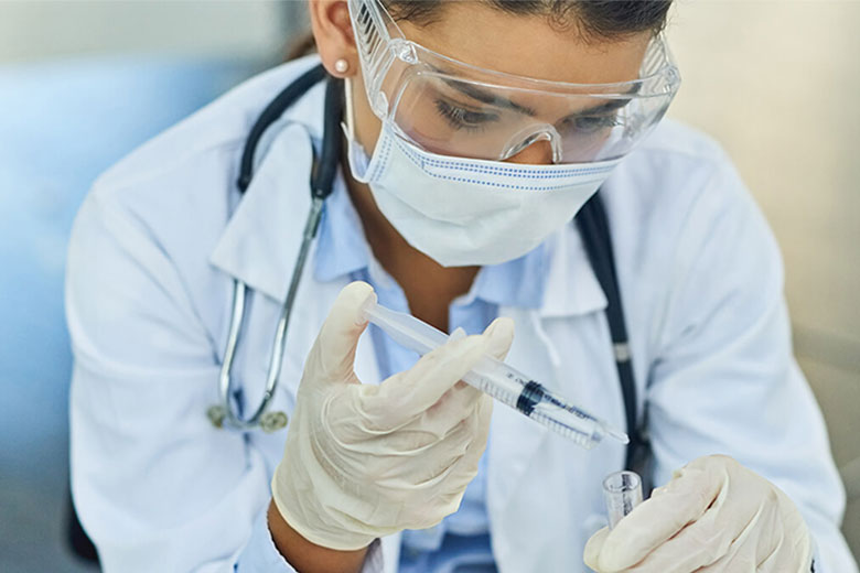 research doctor working on experiment