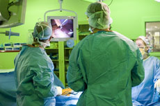 Dmitry Nepomnayshy, MD (left), leads the bariatric surgical team during a laparoscopic bypass surgery at Lahey Hospital & Medical Center