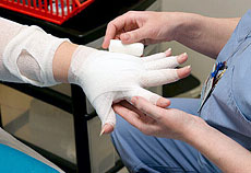 Lahey physical therapist performing compression bandaging