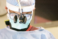 spine center Image of doctor in surgery